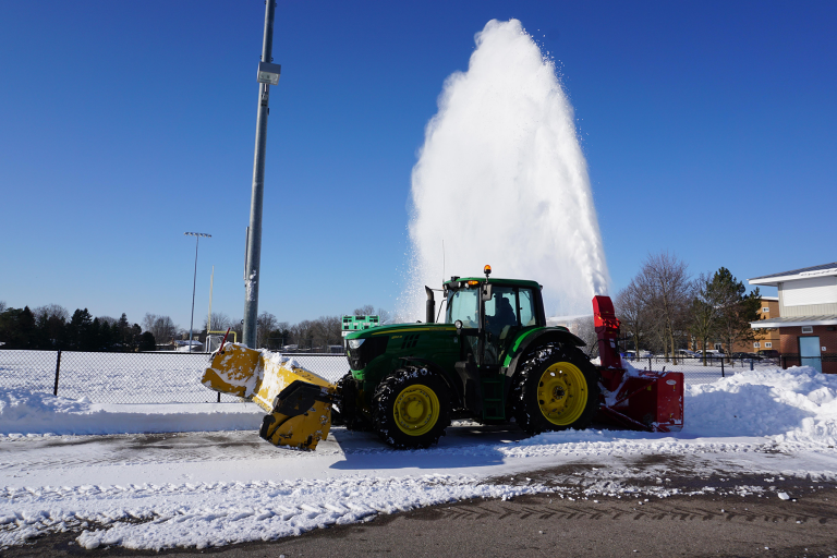 Green Tractor Snow Removal